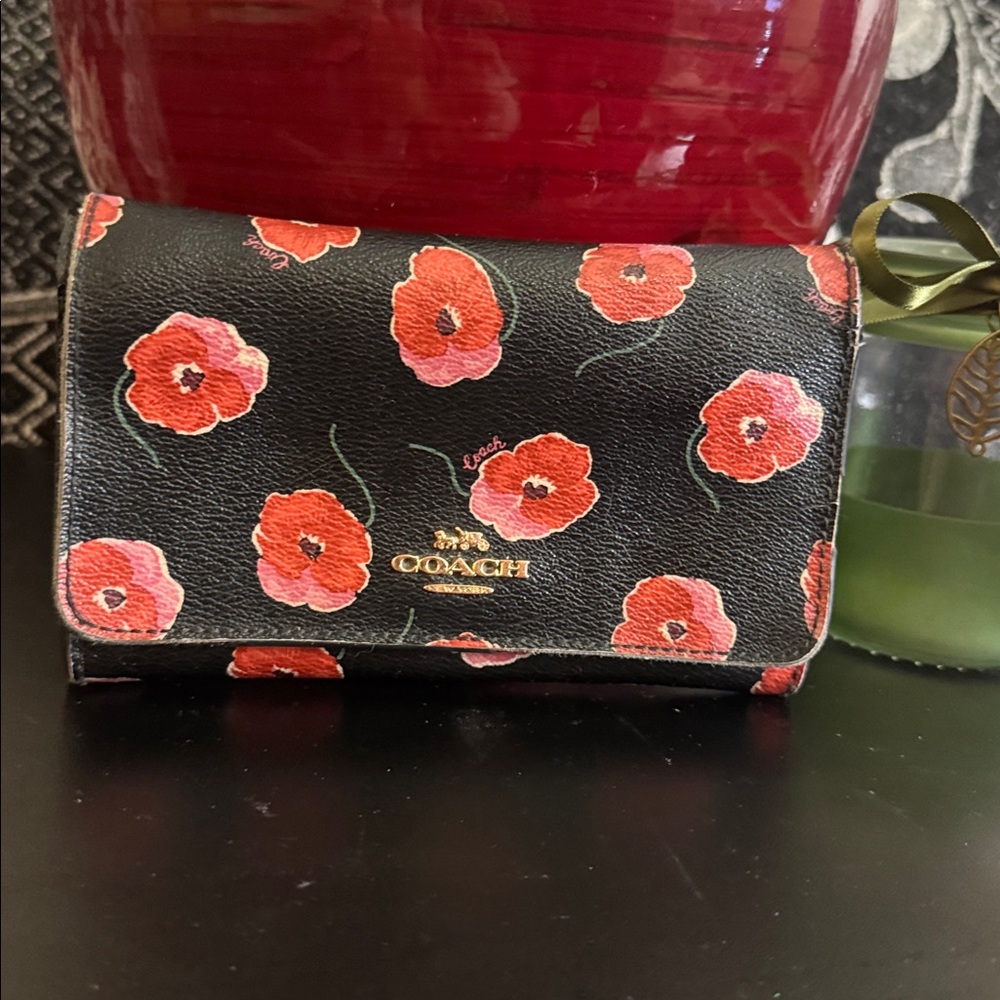 COACH bifold wallet with cute poppy print. Change pocket in back. Snap closure. - Picture 3 of 16